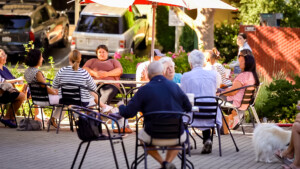 People sitting enjoying outdoor weather