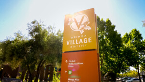 yellow sign saying Orinda Village District