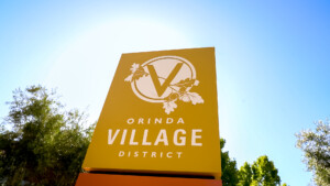 yellow sign saying Orinda Village District