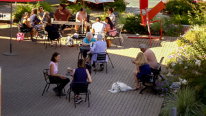 People sitting enjoying outdoor weather