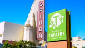 red Orinda Sign and light green Orinda Theatre sign