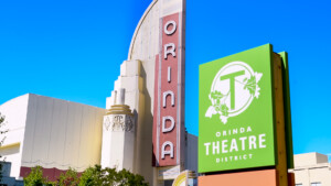 red Orinda Sign and light green Orinda Theatre sign